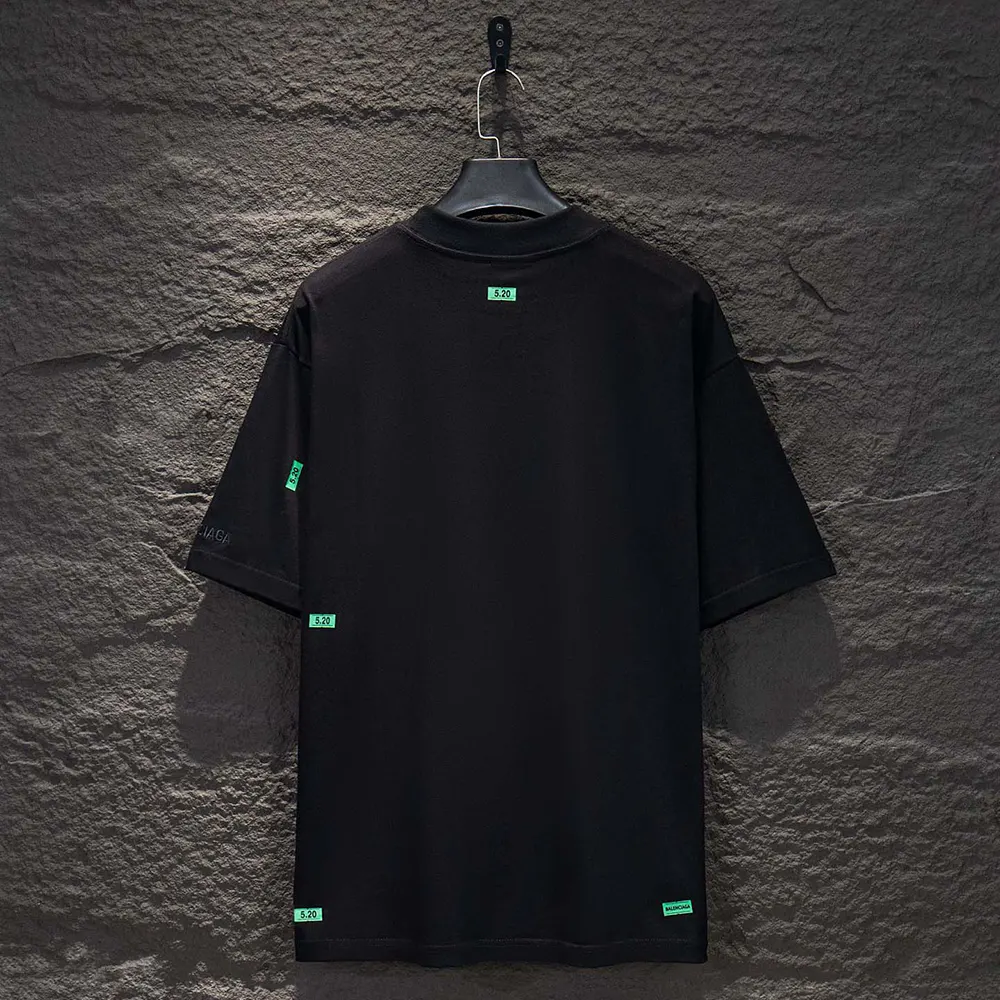 Side angle showing medium fit silhouette of Balenciaga Men 520 T-Shirt