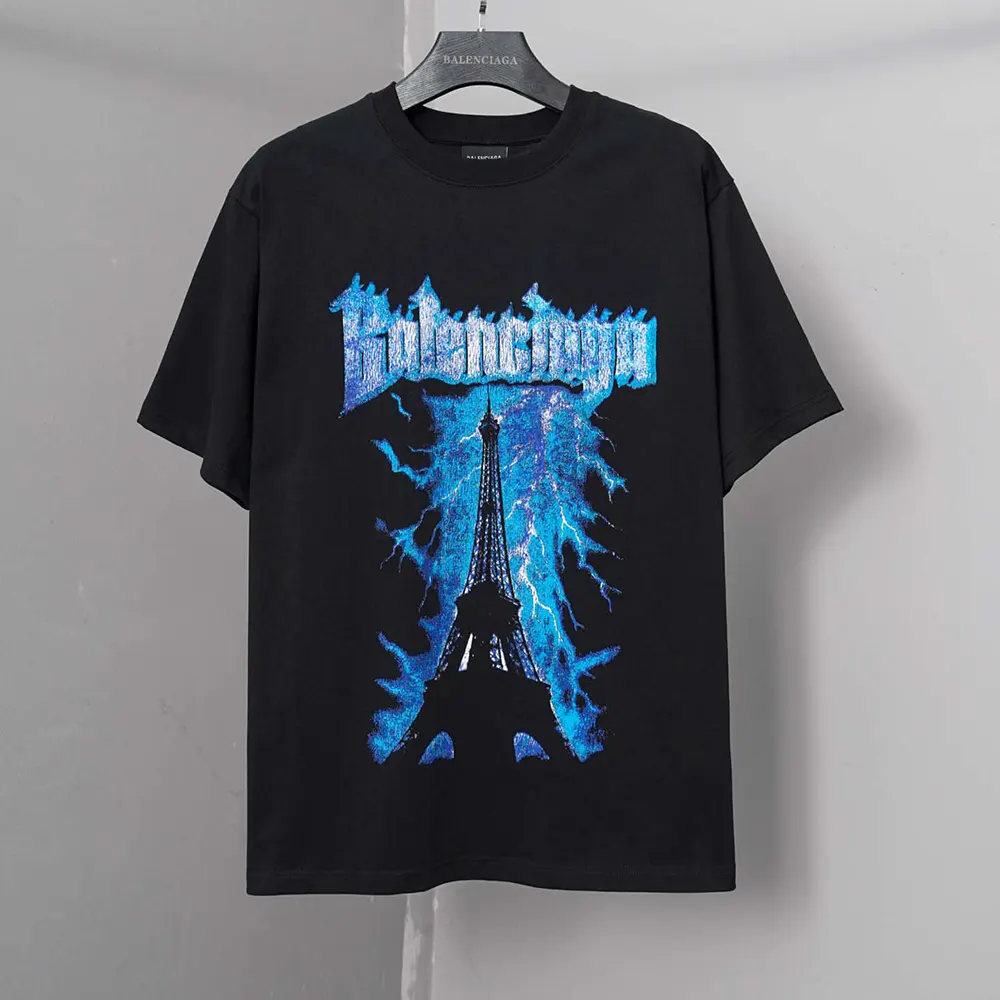 Close-up of black dry jersey fabric and subtle Balenciaga logo on oversized T-shirt