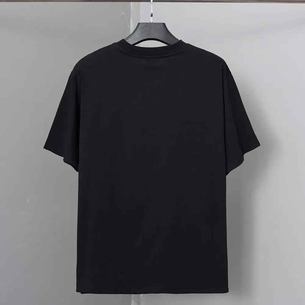 Side angle showing oversized fit of Balenciaga Women Sacré Coeur T-Shirt