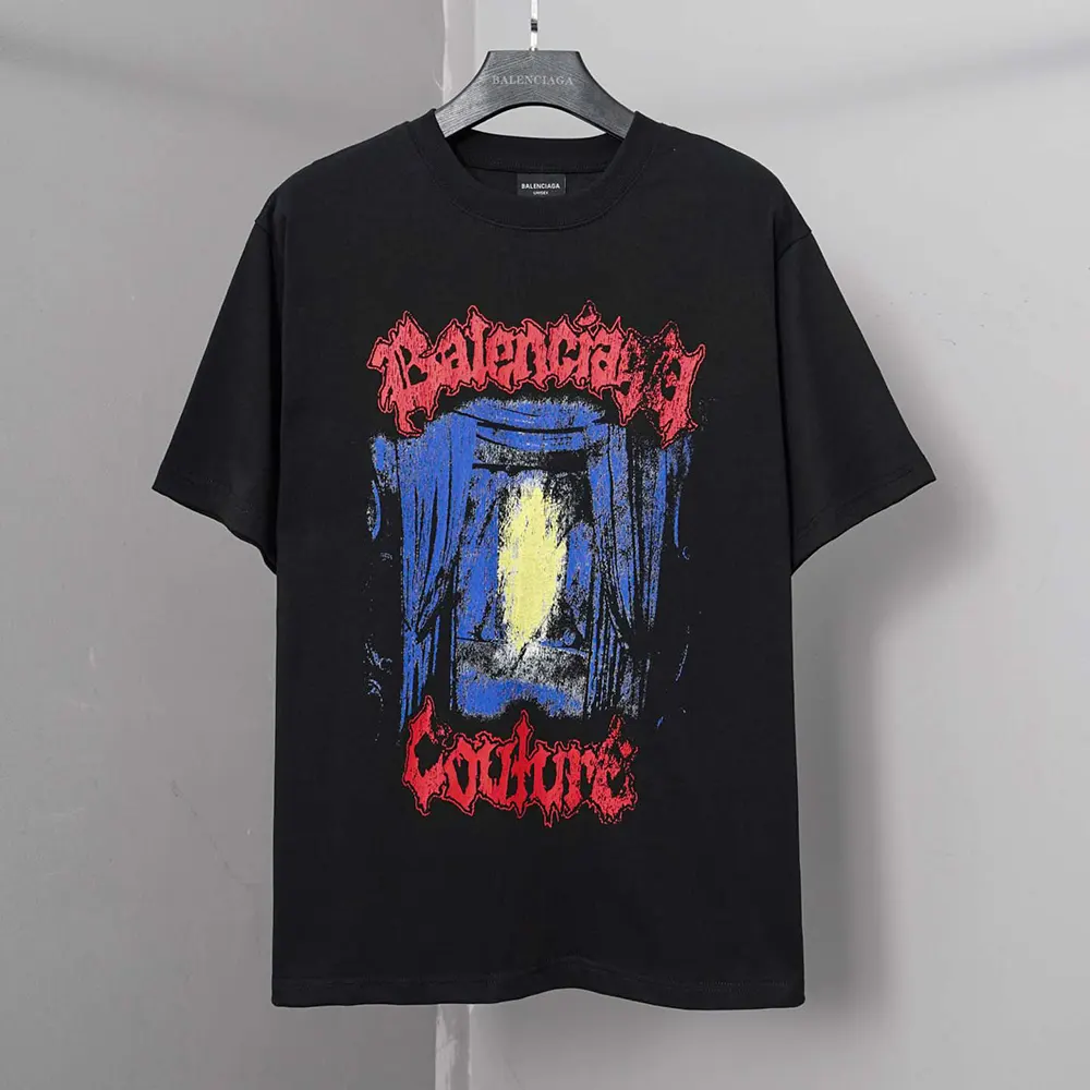Close-up of fabric texture and logo on Balenciaga black T-shirt