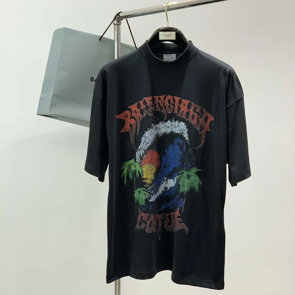 Close-up of Balenciaga logo embroidery on oversized T-shirt