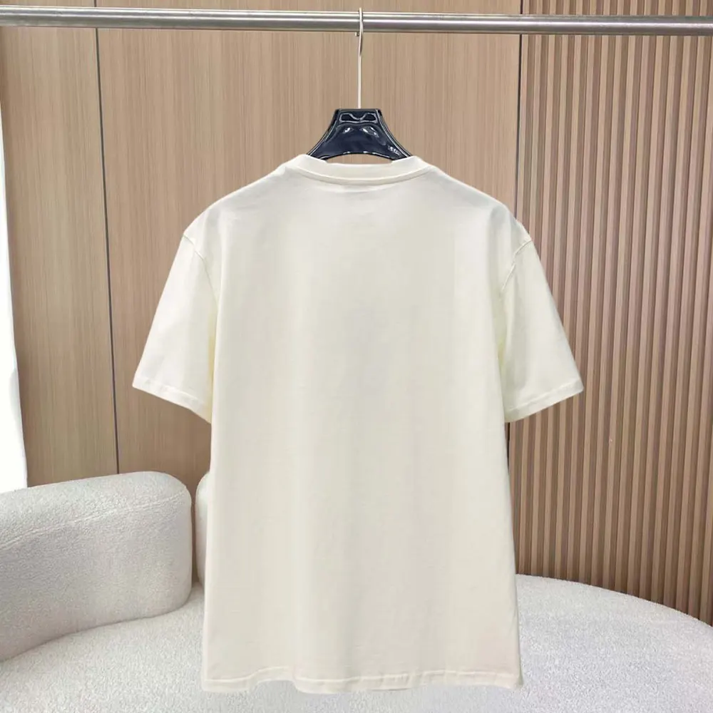 Side angle showing fit of Burberry Women Check Knight Stamp Cotton T-shirt