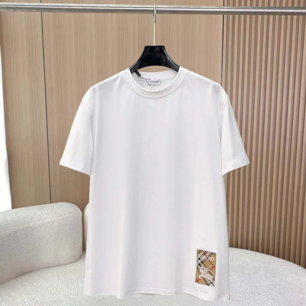 Close-up of Burberry Check Label patch detail on white T-shirt