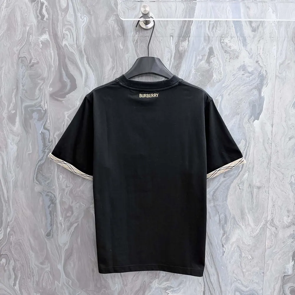 Side angle of Burberry Women Check Trim Cotton T-shirt-Black on mannequin