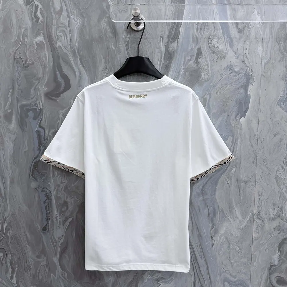 Side angle of Burberry Women Check Trim Cotton T-shirt-White highlighting fabric texture