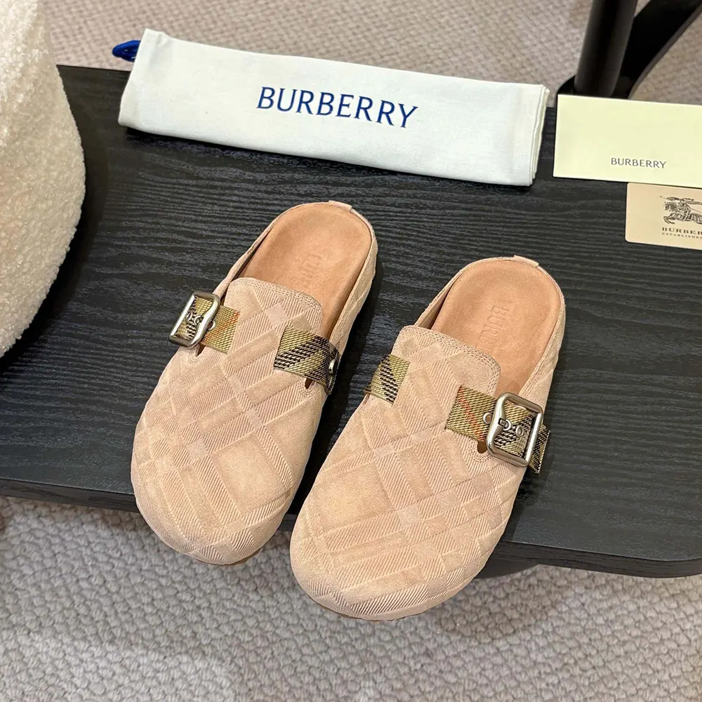 Close-up of signature check strap on Burberry Unisex Check Denim Urchin Clogs-Flora Pink