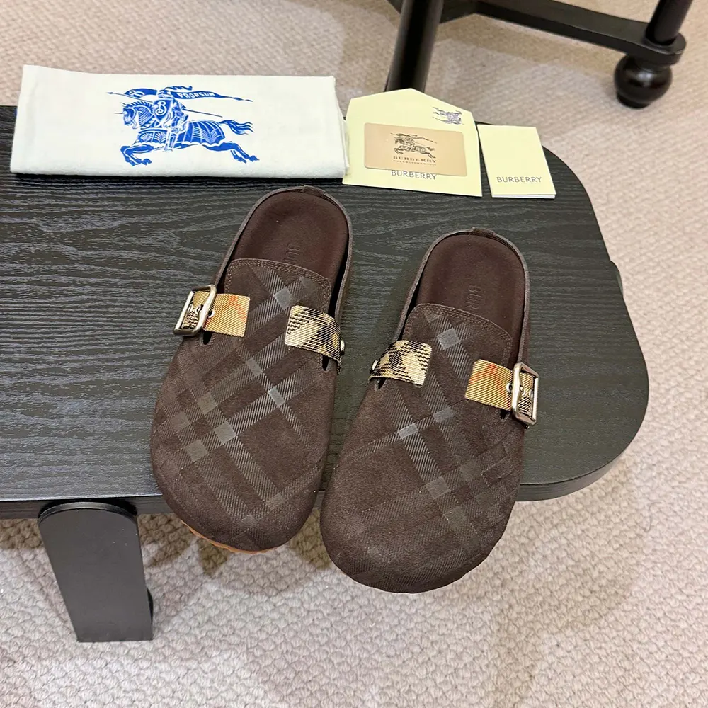 Close-up of Burberry check detail on denim sandal strap