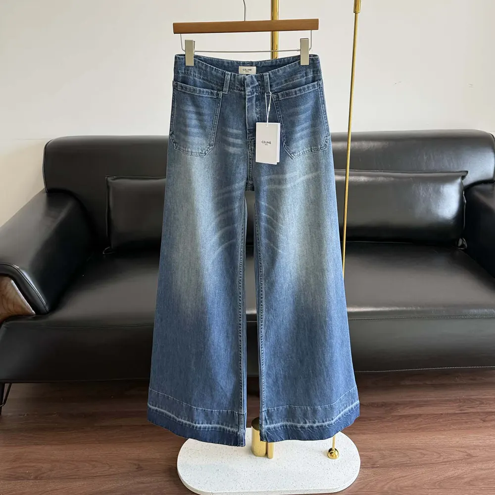 Close-up detail of lightweight cotton denim texture on Celine jeans