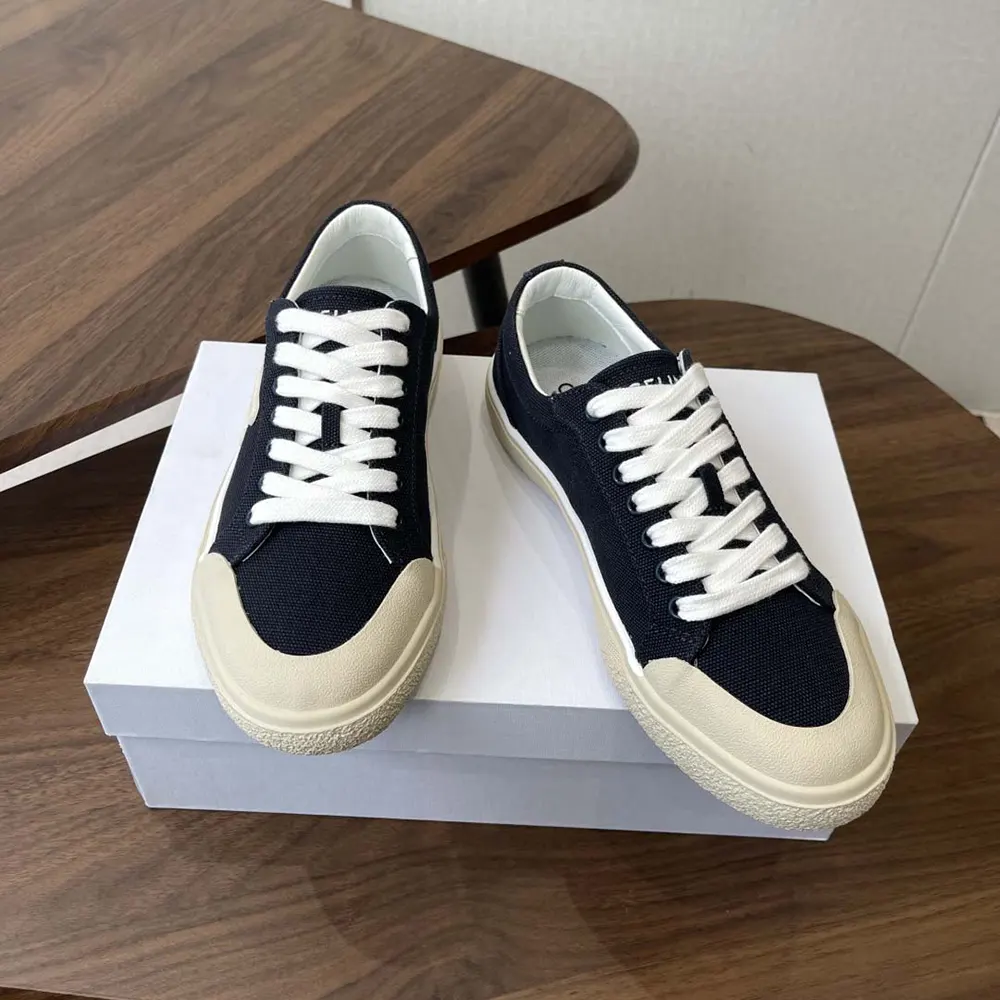 Overhead shot showing black canvas texture on Celine Unisex Alan Sneaker
