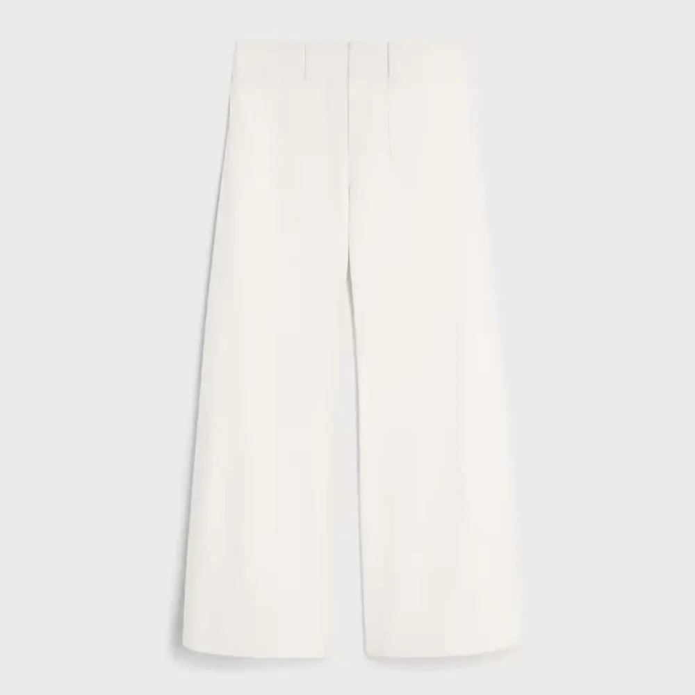 Front view of Celine Men Flare Jeans 004 in crisp white denim