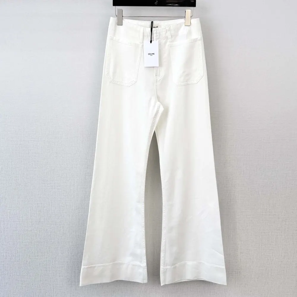 Close-up of metal hardware on white Celine Men Flare Jeans 004