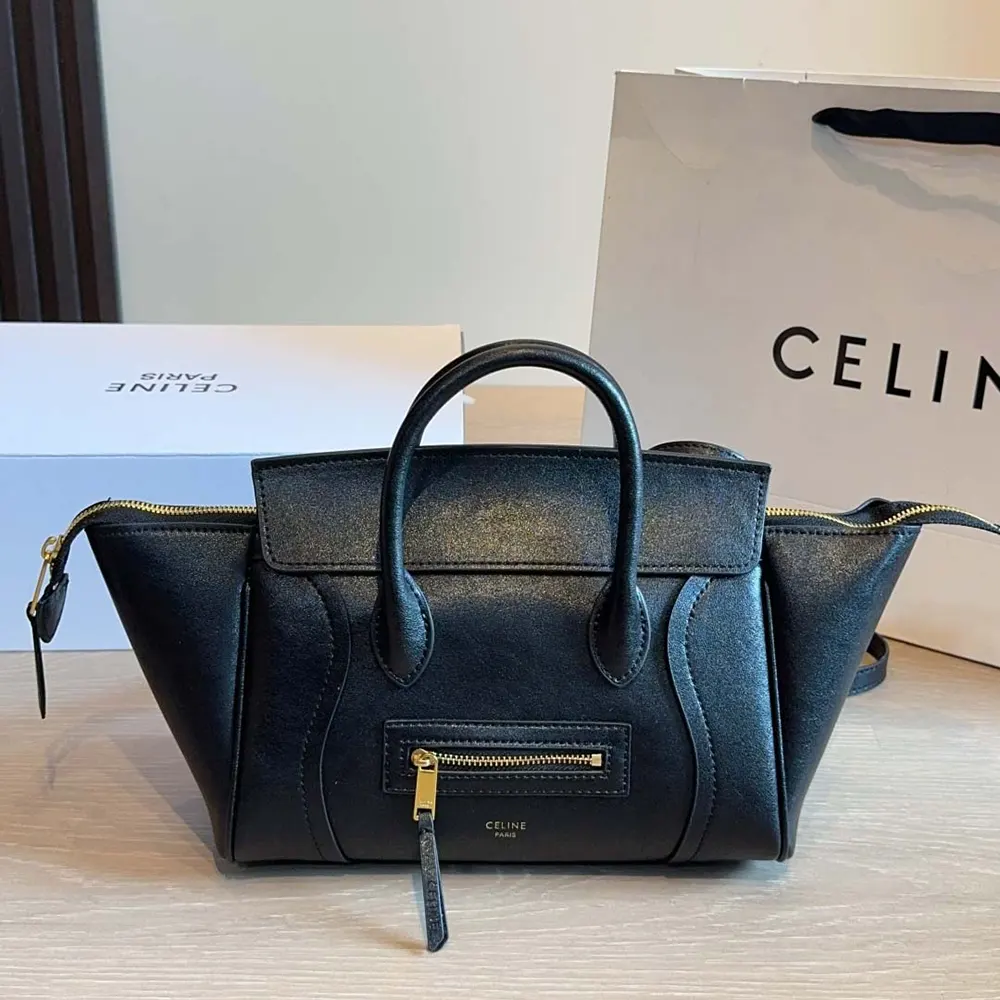 Side angle showcasing silver-tone hardware on Celine Women Little Luggage bag