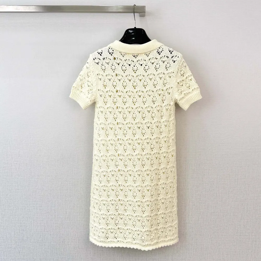 Side detail showing hidden zipper on Celine Women Mini Dress in white