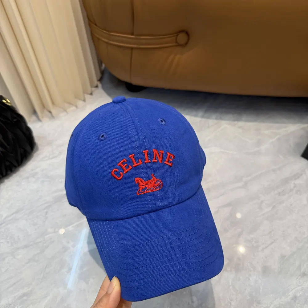 Close-up of embossed logo on Celine Women Richelieu Cap In Cotton Twill-Navy
