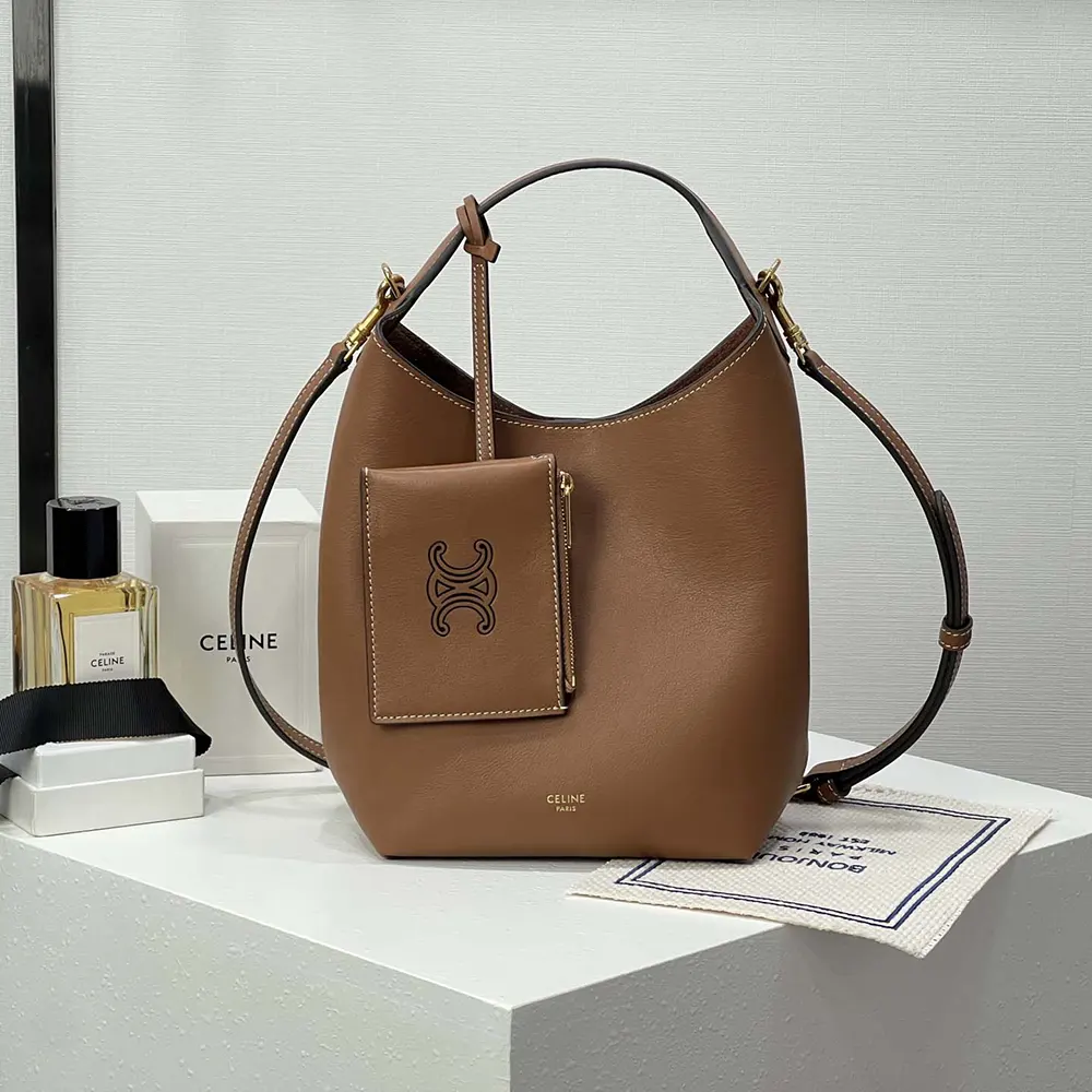 Close-up of gold-tone hardware on Celine Women Small Hobo brown bag