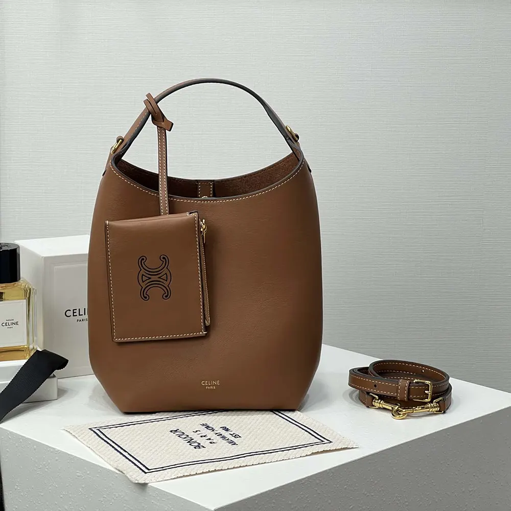 Side profile showing silhouette of Celine Women Small Hobo in tan leather