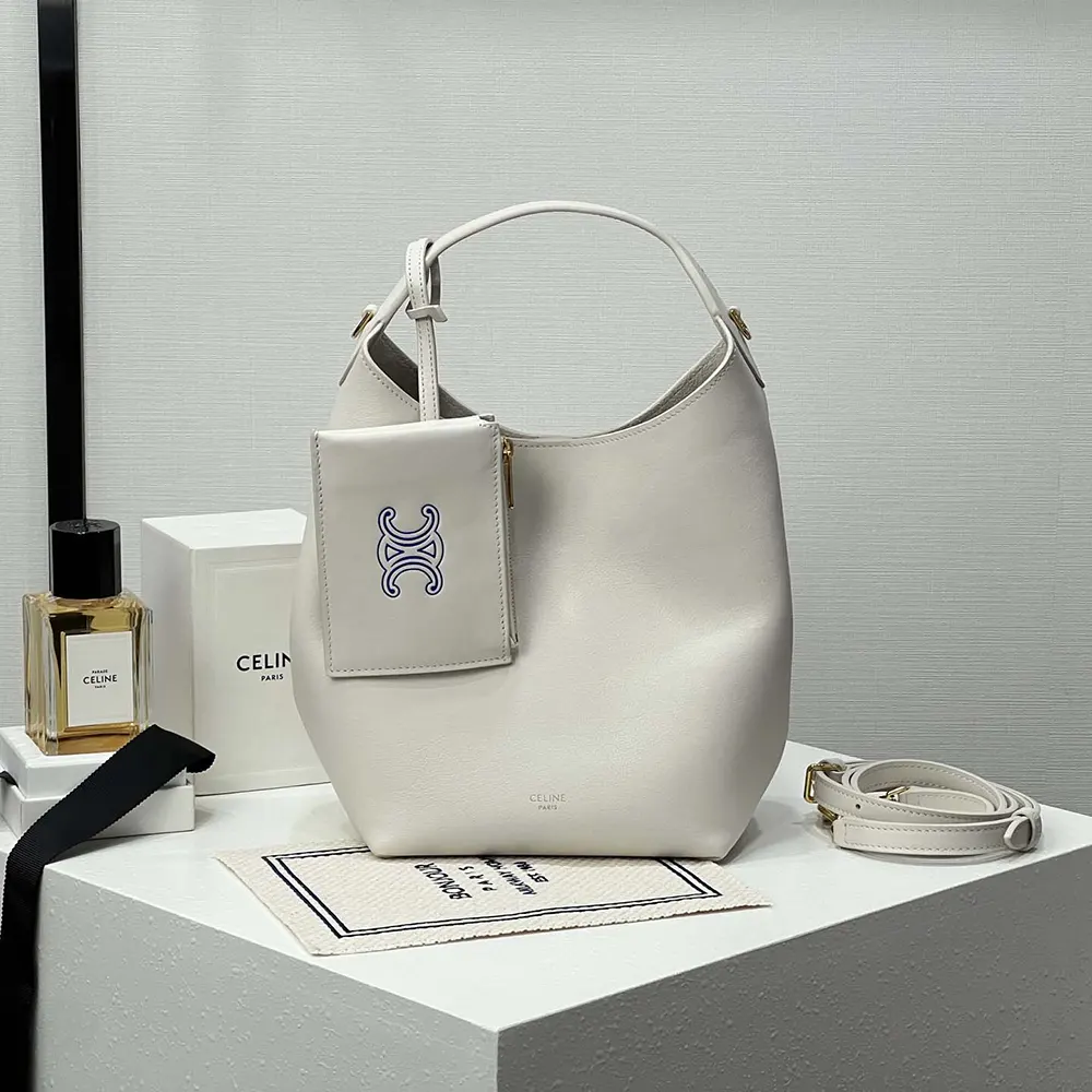 Close-up of gold-tone hardware on Celine Women Small Hobo white bag