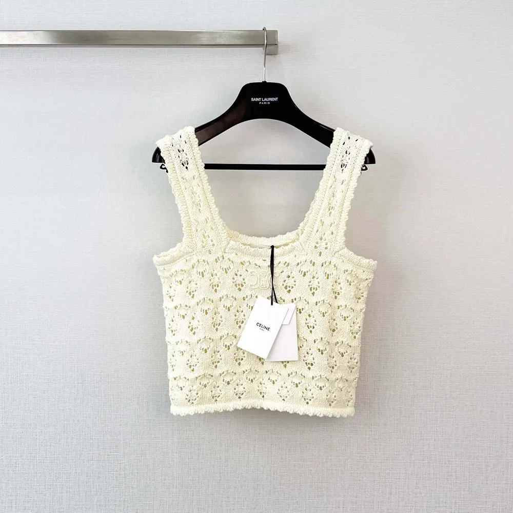 Side angle showing relaxed fit of Celine Women Top in white