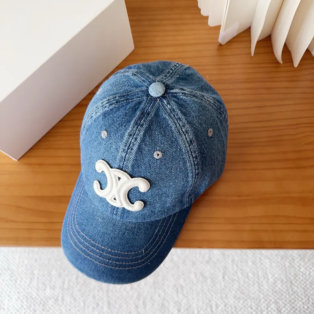 Back detail showing adjustable leather strap on Celine baseball cap