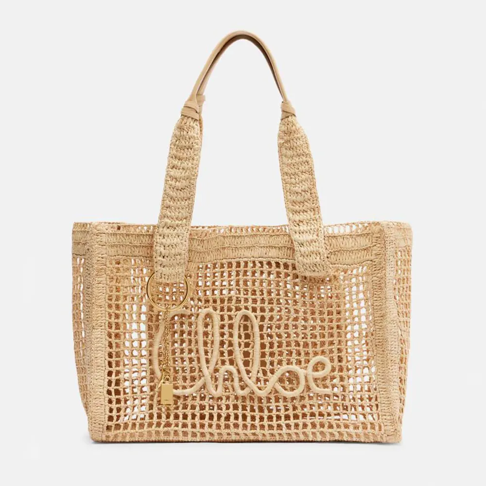 Front view of Chloe Women Summer Banana East-west Tote Bag in Raffia & Buffalo Leather-Beige
