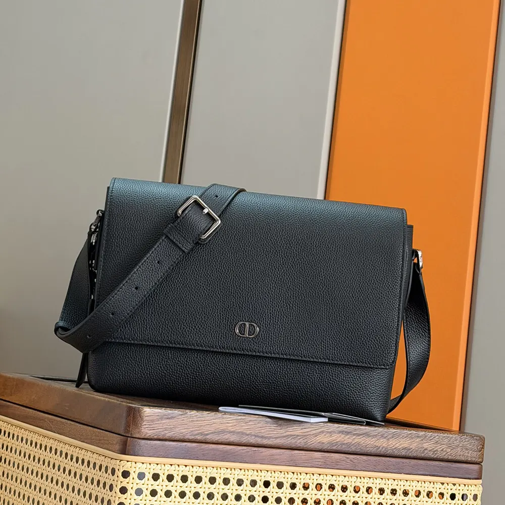 Close-up of matte grained calfskin and CD logo clasp on Dior bag