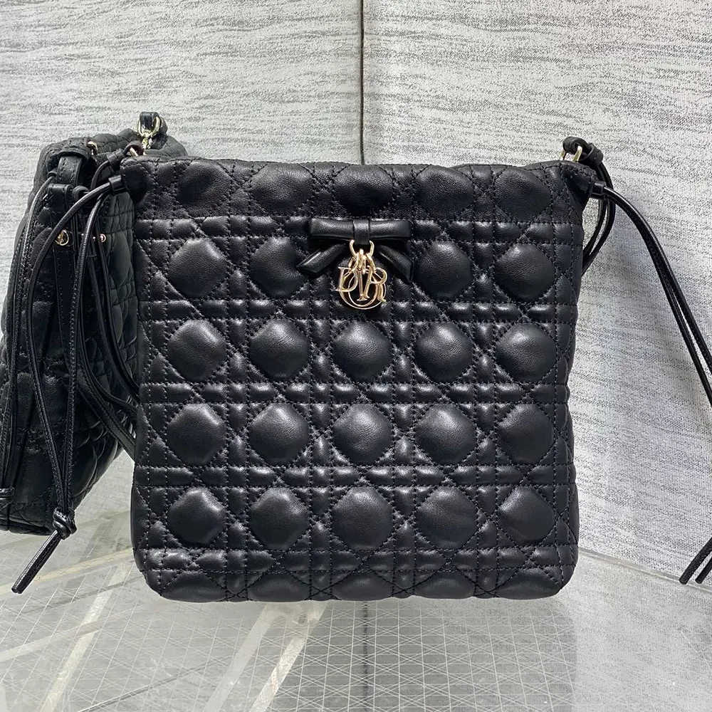 Close-up of Cannage quilting and silver hardware on Dior Women Adiorable Mini Bucket Bag