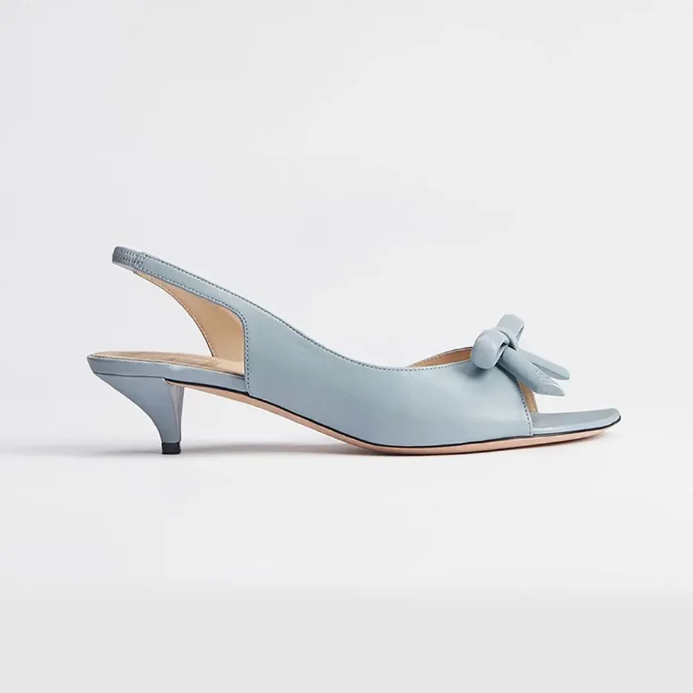 Side view of Dior Women Bow Heeled Slingback Sandal Bleu Ciel Lambskin