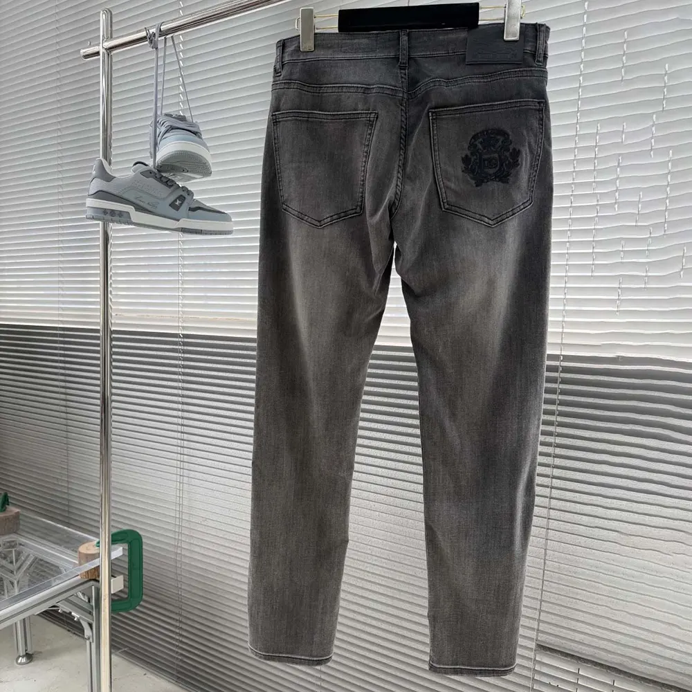 Side angle showing relaxed silhouette of Dolce Gabbana D&G Men Loose Stretch Denim Jeans