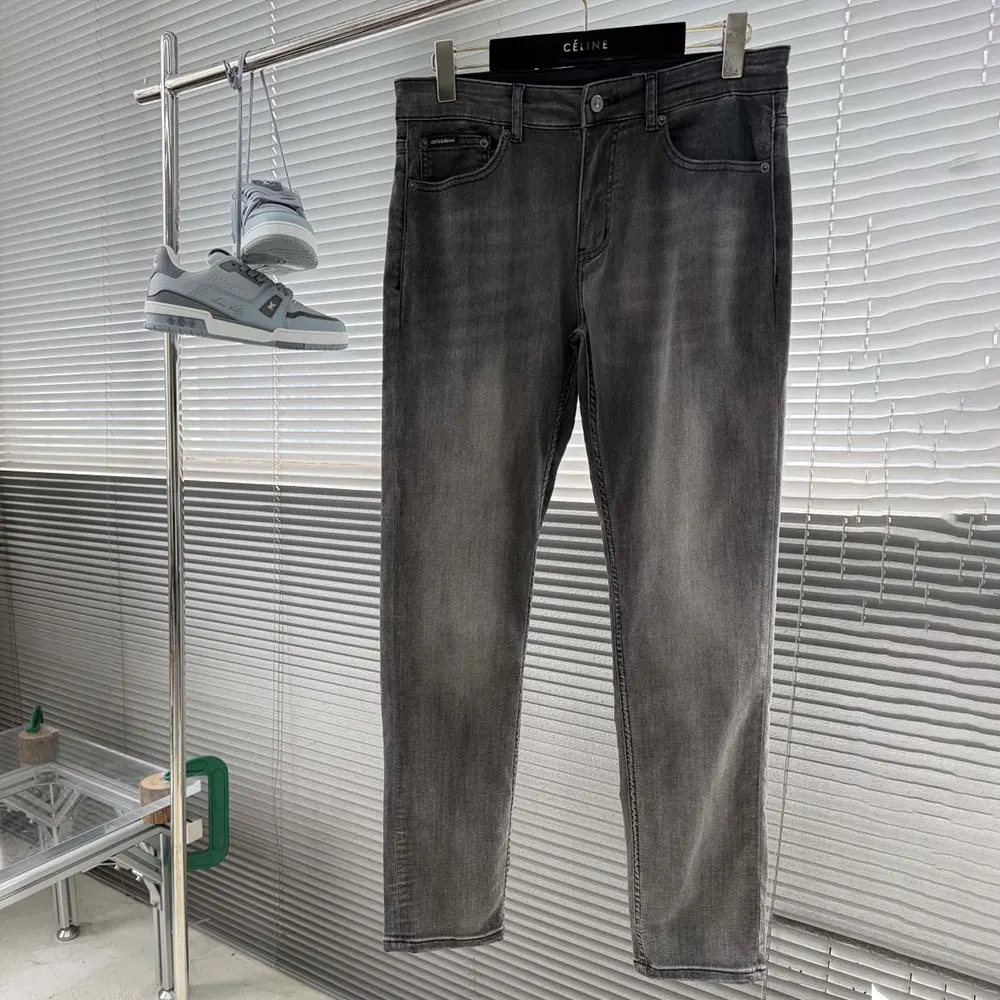 Close-up of signature hardware on Dolce Gabbana D&G Men Loose Stretch Denim Jeans