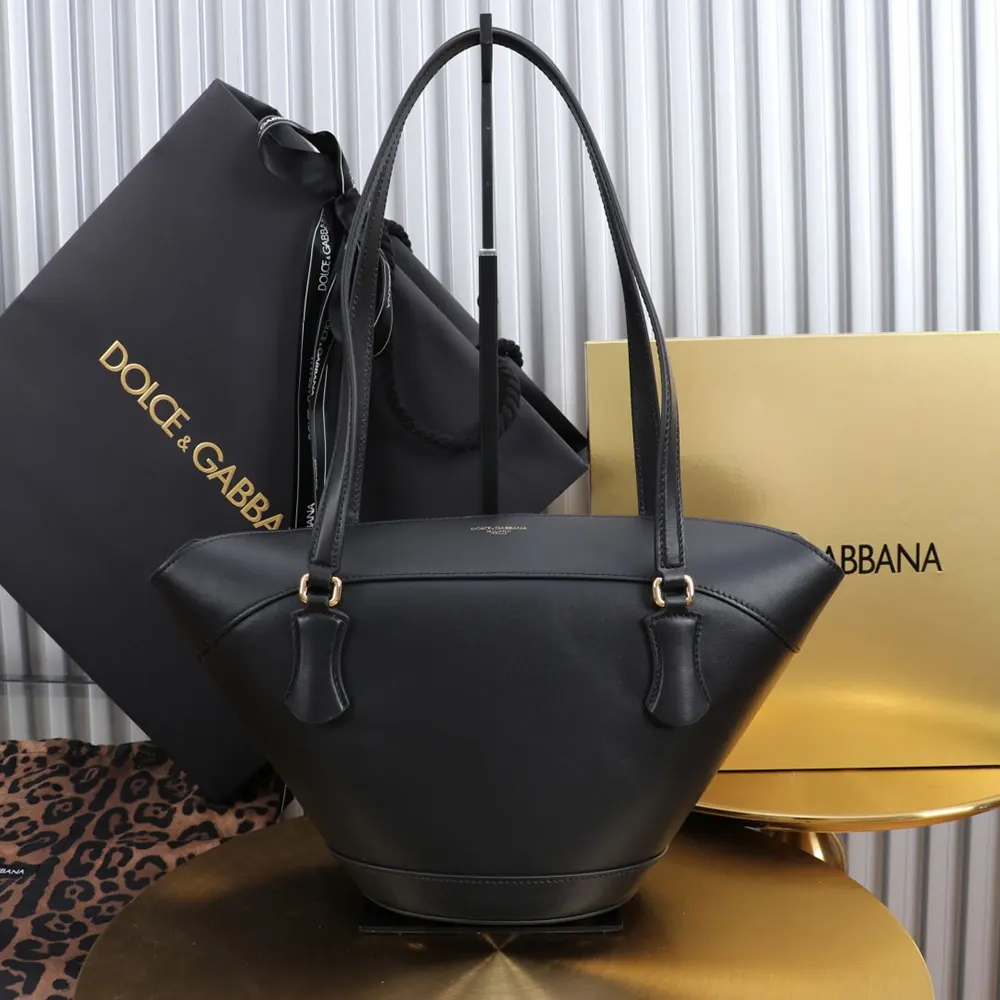 Side angle showing silhouette of Dolce Gabbana D&G Women Capri Crow’S Nest-Black bag