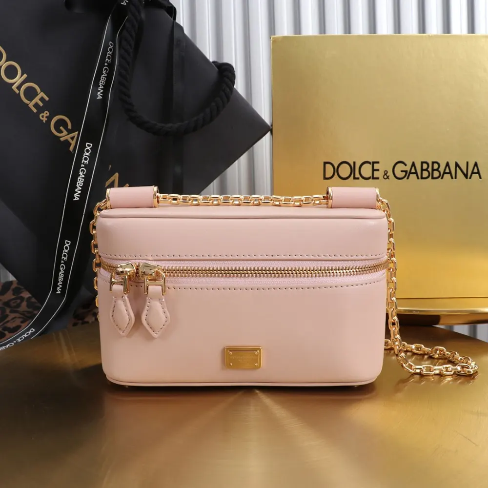 Close-up of pink leather and gold-tone hardware on Dolce Gabbana D&G Women Sicily Crossbody Bag-Pink