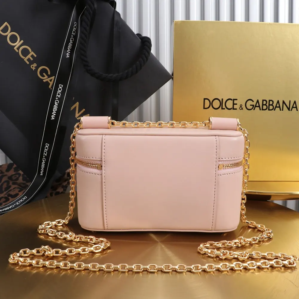 Side angle showing slim silhouette of Dolce Gabbana D&G Women Sicily Crossbody Bag-Pink