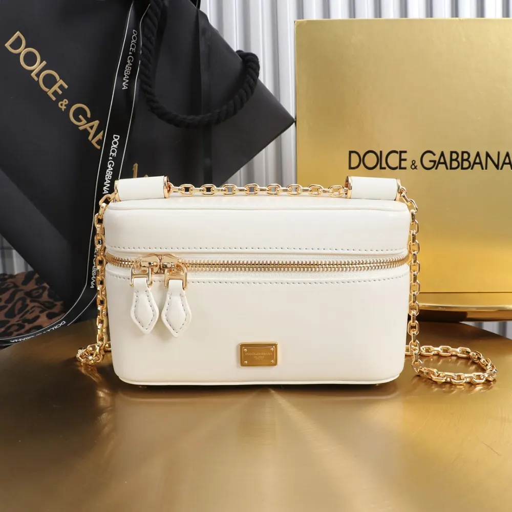 Close-up of gold-tone hardware and textured leather on Sicily Crossbody Bag