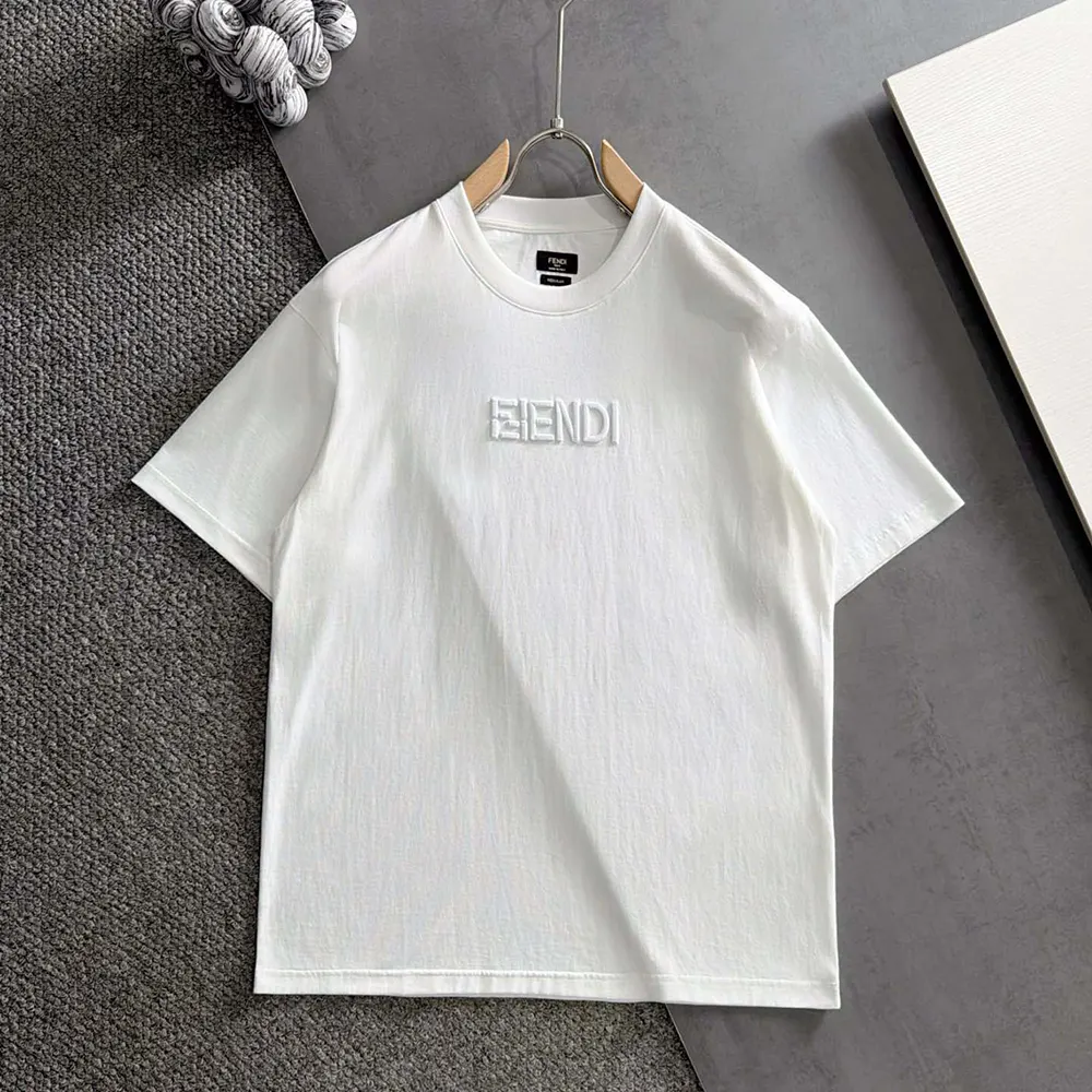 Close-up of Fendi logo detail on white cotton T-shirt