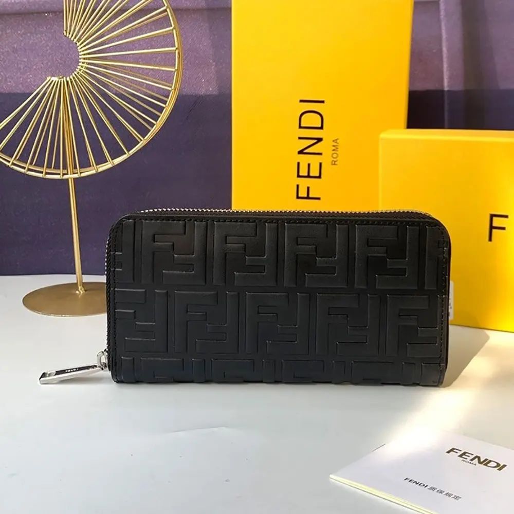 Close-up of embossed FF motif on Fendi Men Zip Around Wallet