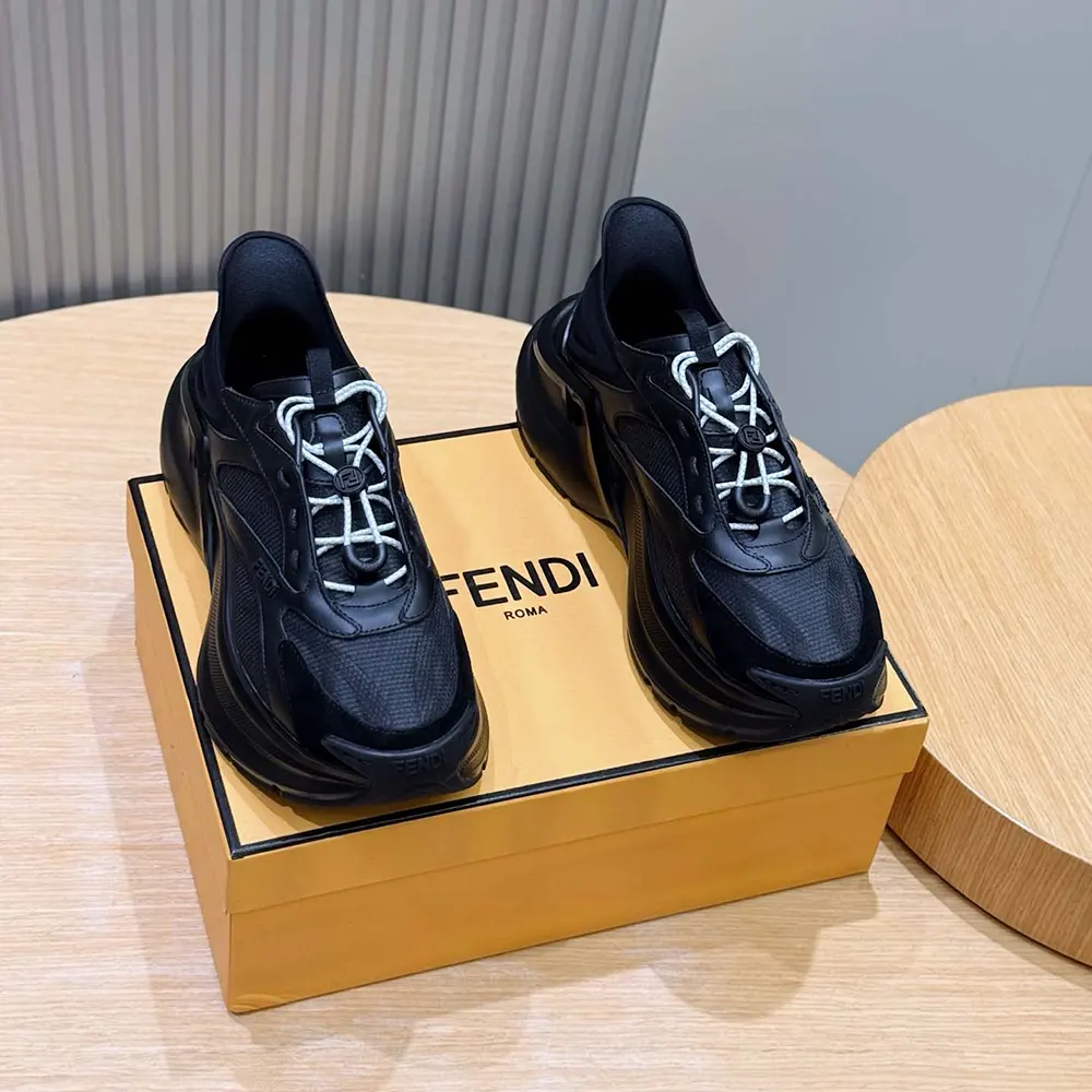 Close-up on lace and embossed Fendi logo hardware of F-Light Sneakers