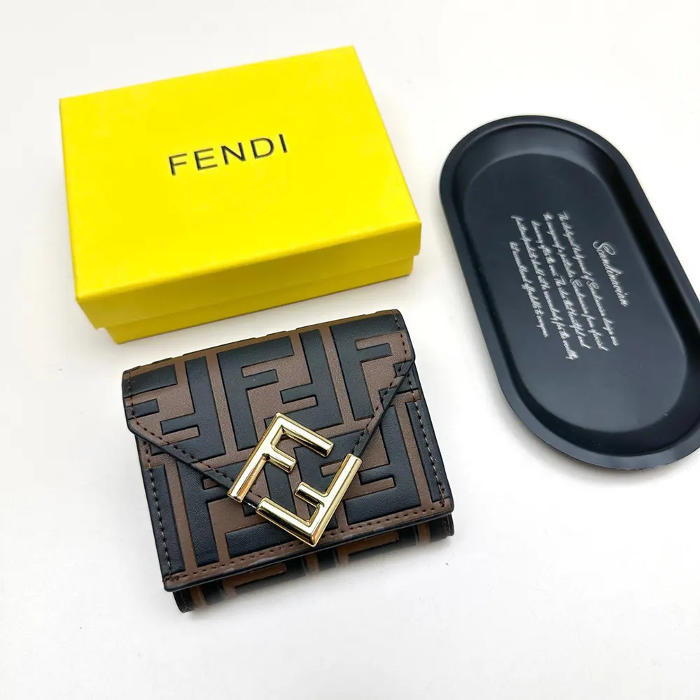 Close-up of gold-tone hardware on Fendi Unisex FF Diamonds Wallet
