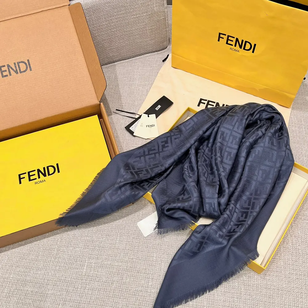 Detail of signature FF hardware on Fendi Unisex navy blue shawl