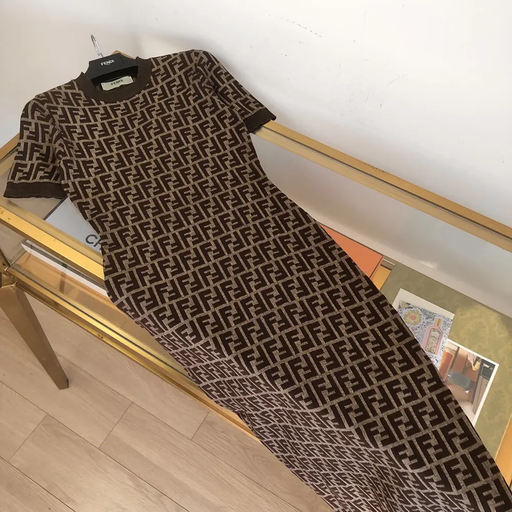 Close-up of fabric and branded hardware on Fendi Women Brown FF Cotton Dress