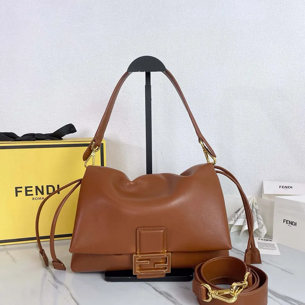 Close-up of gold-tone hardware on Fendi Women Mamma Baguette Bag