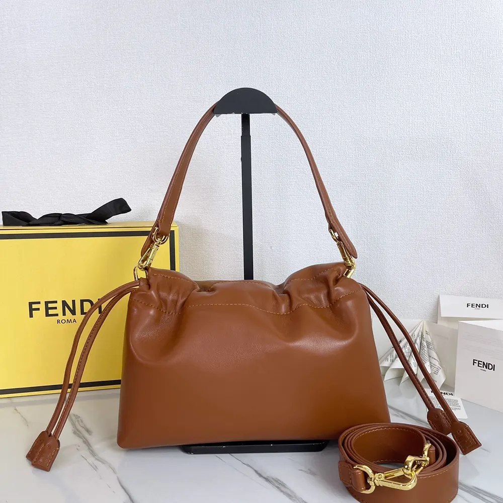 Side profile showing silhouette of Fendi Women Mamma Baguette Medium Bag