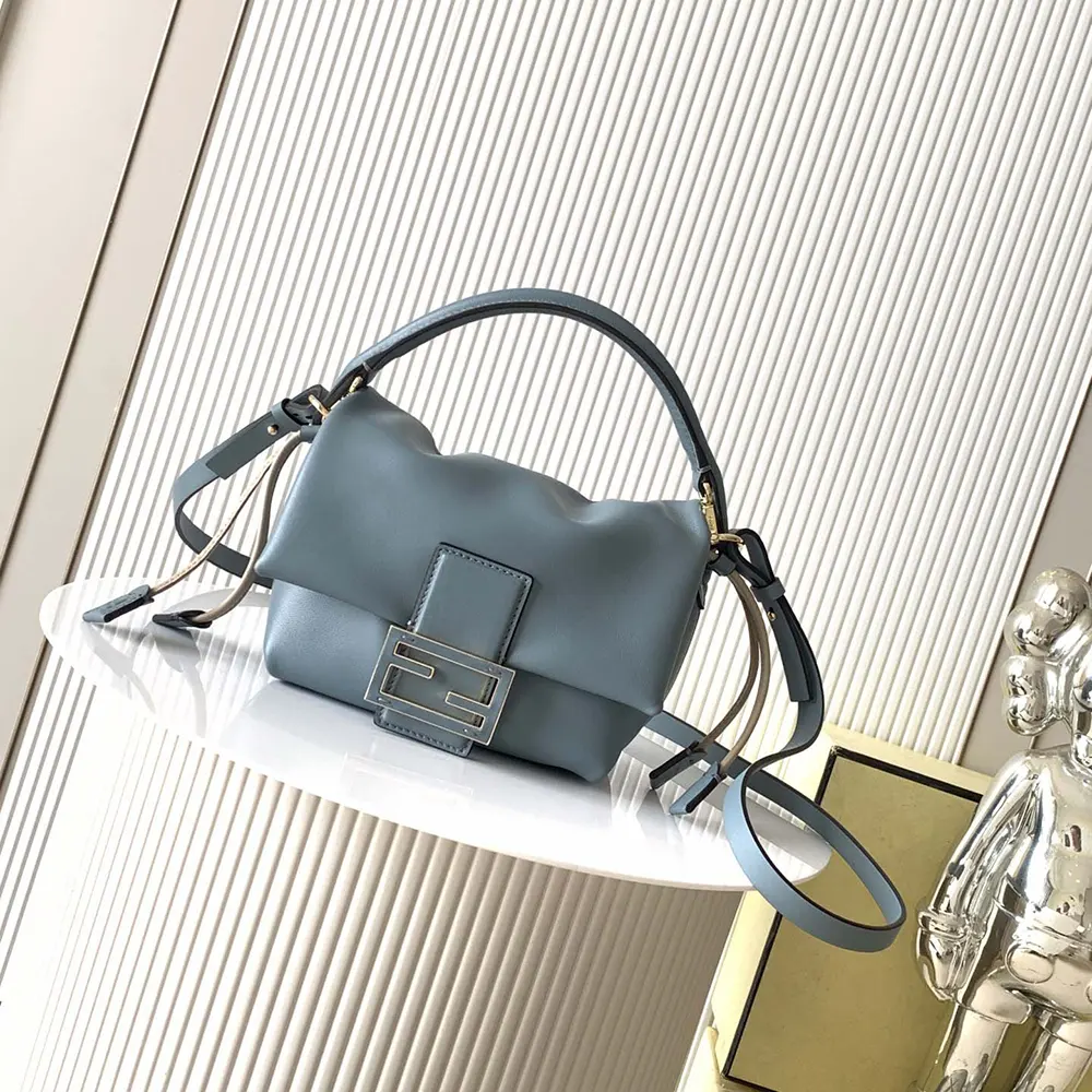 Close-up of gold-tone hardware on Fendi Women Mamma Baguette Small Mini-bag