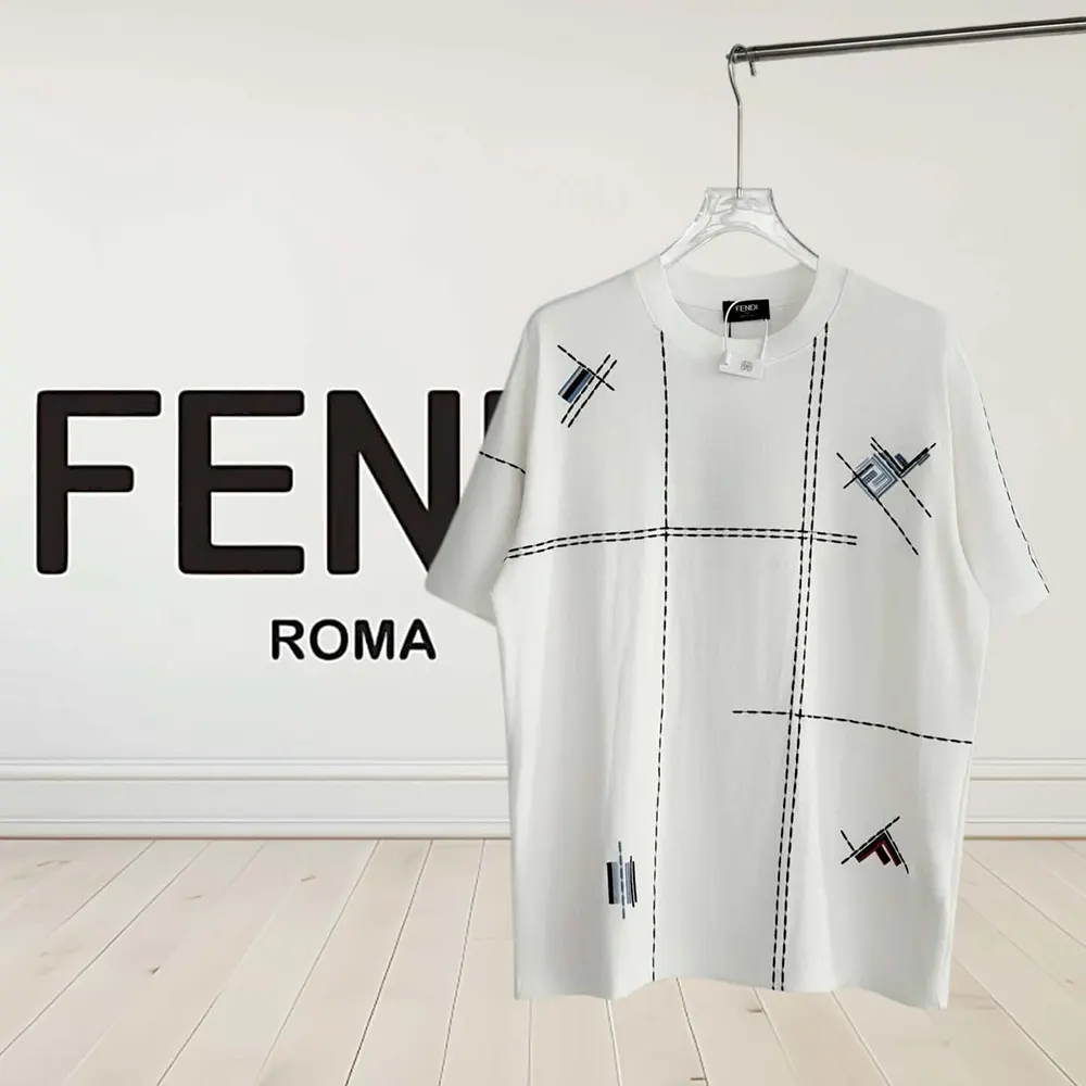 Close-up on Fendi logo embroidery on white cotton t-shirt
