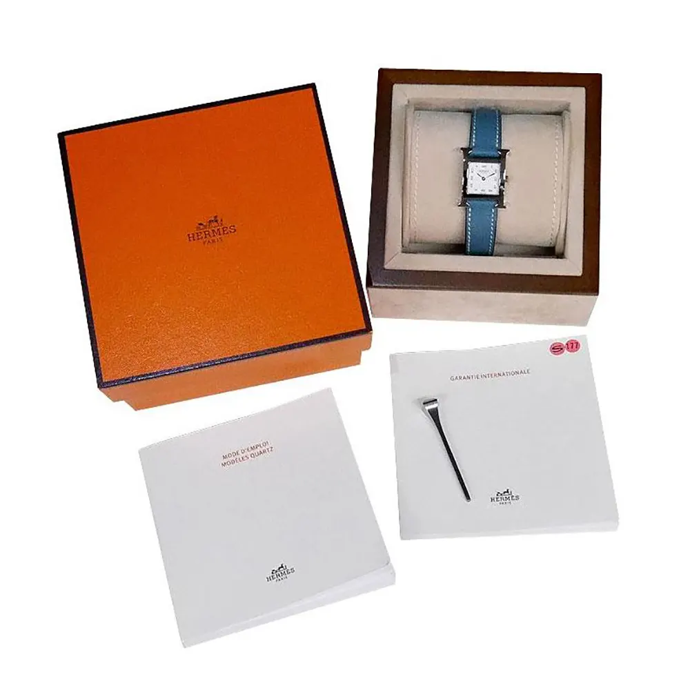 Close-up of signature H-shaped bezel on Hermes Women Heure H Watch Small Model
