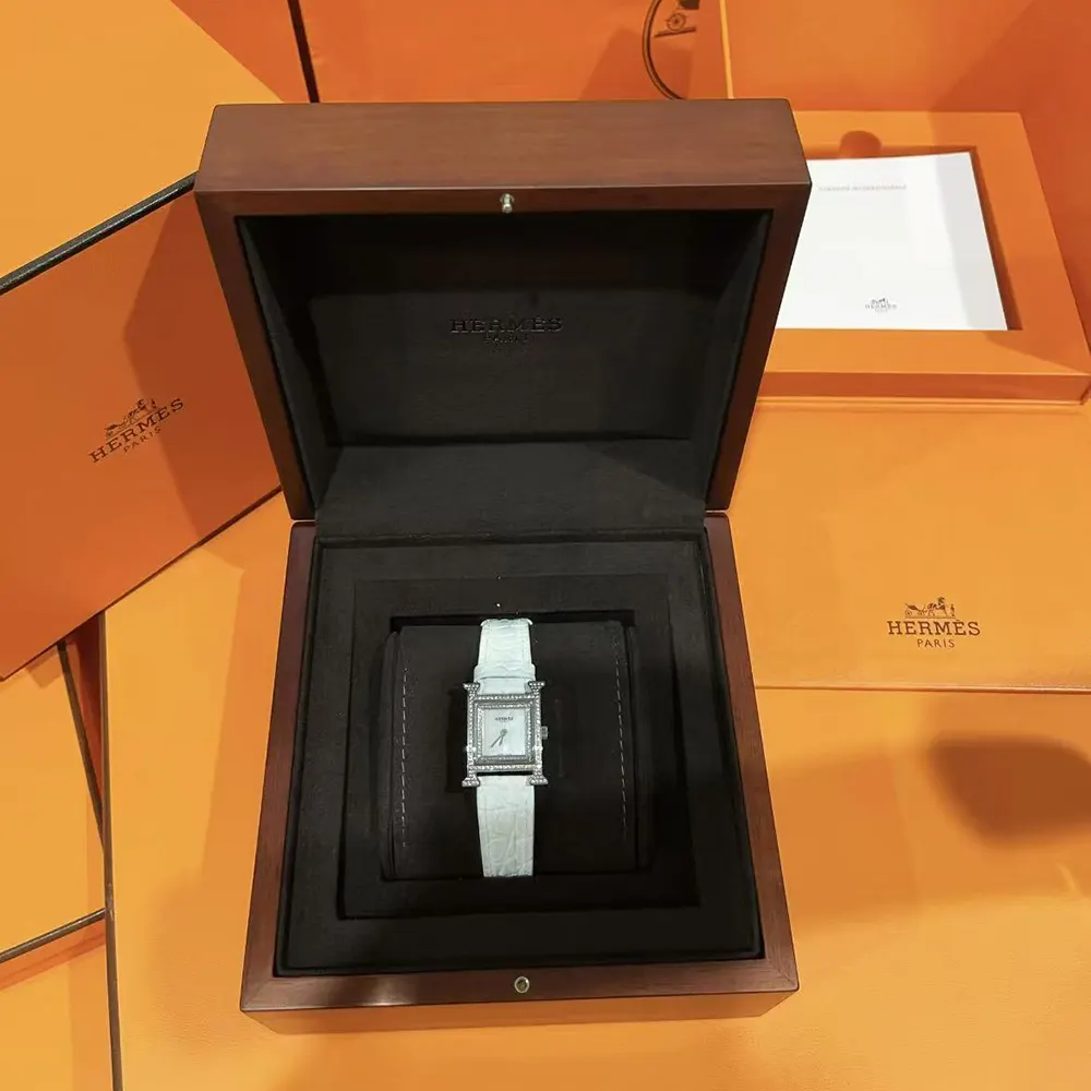 Close-up of H-shaped stainless steel case on Hermes Women Heure H Watch Mini Model