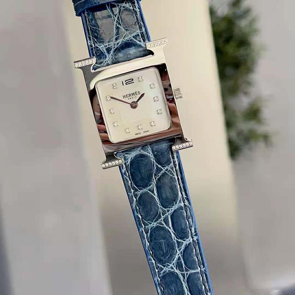 Close-up of diamond-set steel case on Hermes Women Heure H Watch Navy