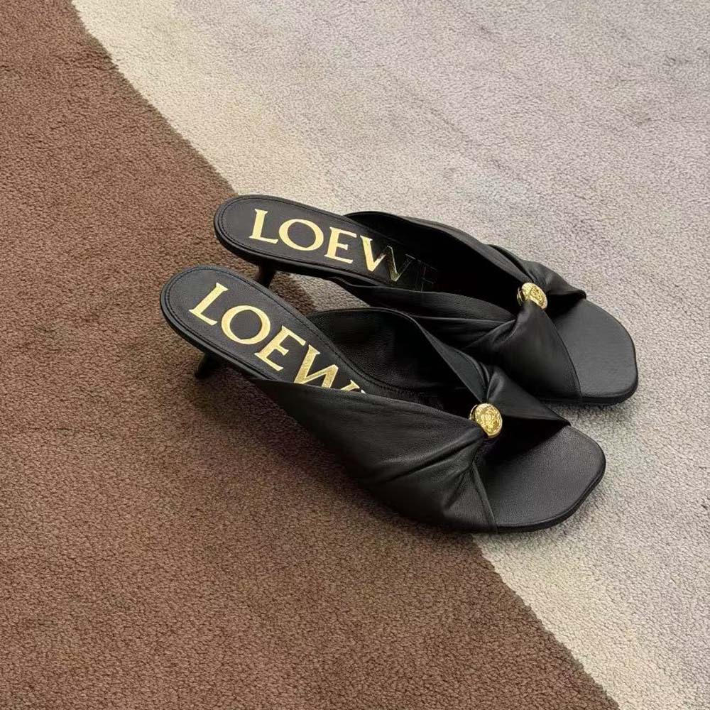 Close-up detail of pebble-textured leather on Loewe Women Pebble Soft Slide