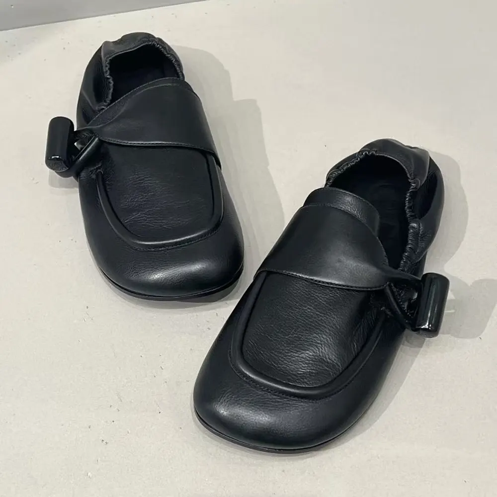 Close-up of toggle hardware detail on Loewe Women Toggle Loafer