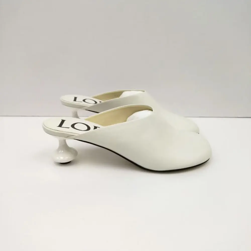 Rear angle of Loewe Women Toy Mule highlighting heel height and finish