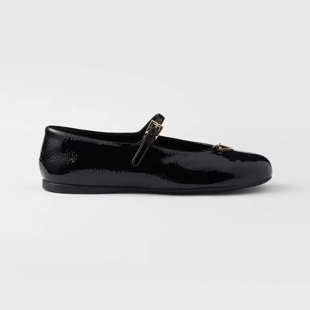 Side view of Prada Women Naplak Patent Leather Ballerinas-Black showing silhouette